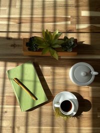 High angle view of coffee cup on table