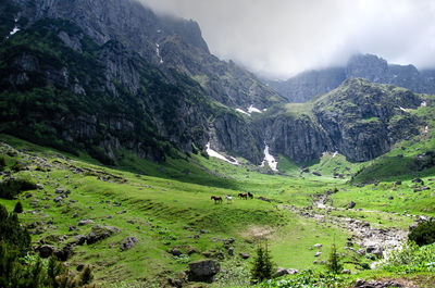 Scenic view of mountains against sky