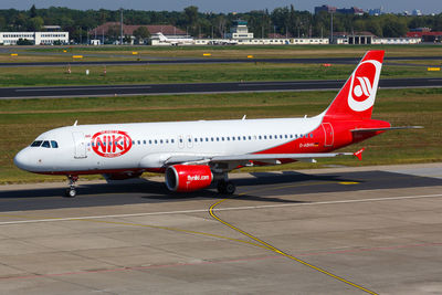 View of airplane at airport runway