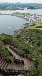 High angle view of cityscape by sea