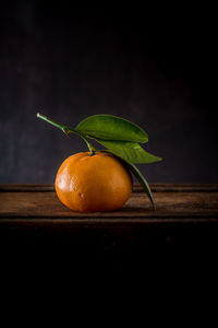 Close-up of orange fruit on table