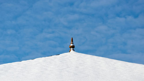 Low angle view of person against sky