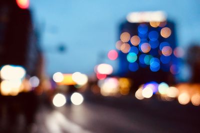 Defocused image of illuminated city street