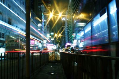 Light trails on road in city at night