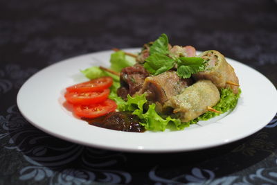 Close-up of salad in plate on table