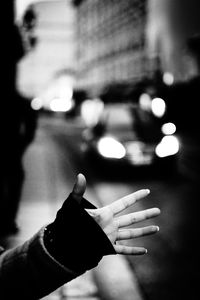 Close-up of hand holding illuminated lights