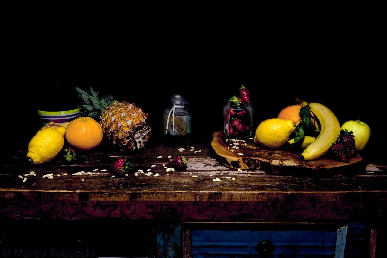 black background, studio shot, fruit, food, food and drink, celebration, table, multi colored, freshness, sweet food, no people, night, ready-to-eat