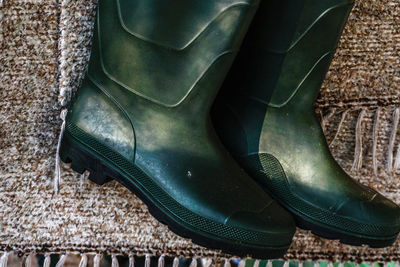 High angle view of black shoes on floor