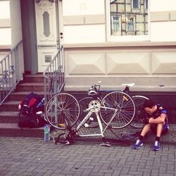 Woman standing against wall