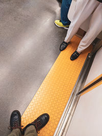 Low section of person standing on floor