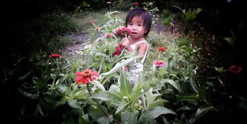 Girl with red flowers