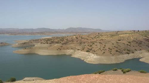 Scenic view of landscape with mountain range in background