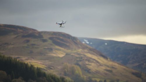 Drone flying over mountains