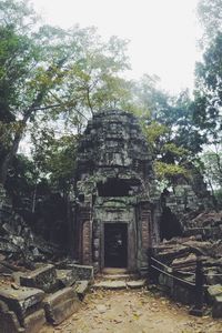 Low angle view of abandoned temple against sky