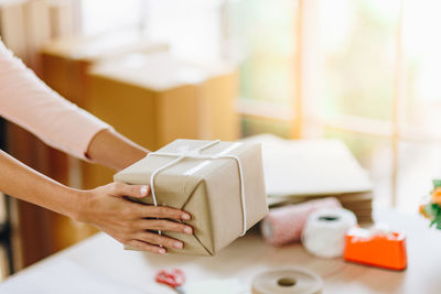 Close-up of woman working on table