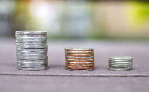 Close-up of coins on table