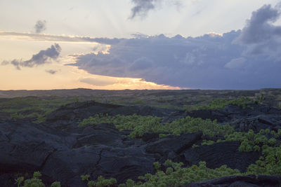 Scenic view of landscape against sky during sunset