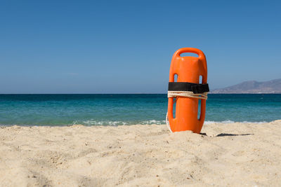 Lifeguard hut on beach against clear sky