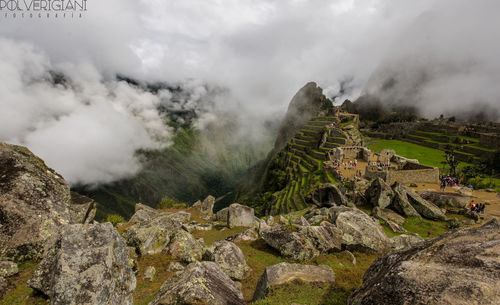 Panoramic view of landscape against cloudy sky