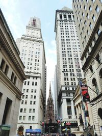 Low angle view of skyscrapers against sky