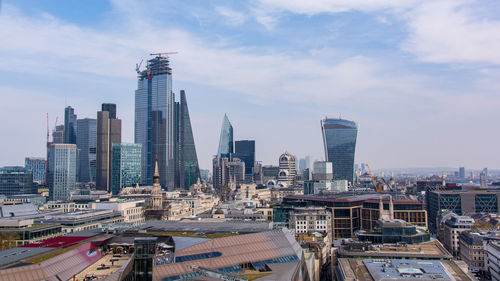 Modern buildings in city against sky london uk