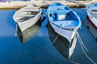 High angle view of fishing boat moored at beach