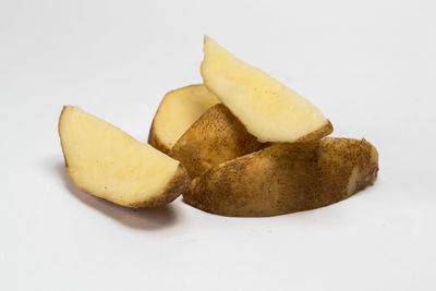 Close-up of bananas on white background