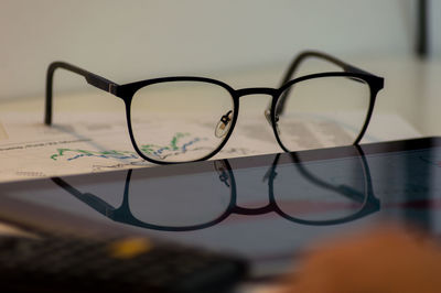 Close-up of sunglasses on table