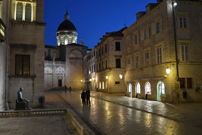 View of illuminated buildings at night