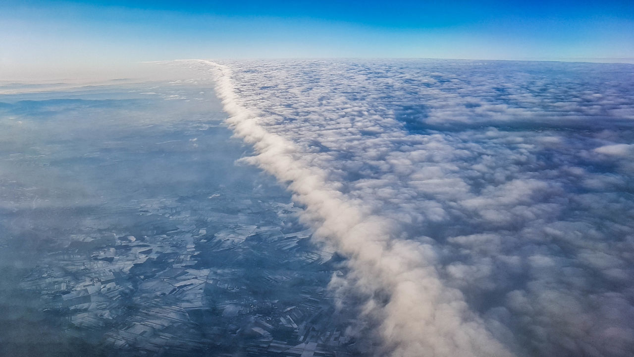 AERIAL VIEW OF CLOUDS OVER SEA