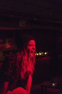 Young woman performing at a nightclub