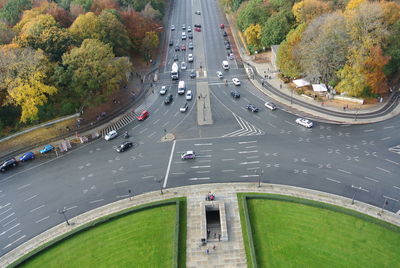 High angle view of road amidst trees in city