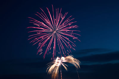 Firework display at night