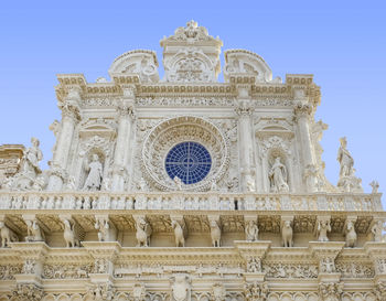 Facade detail at the basilica di santa croce in lecce, a city in apulia, italy