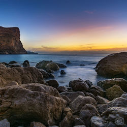 Scenic view of sea against sky during sunset