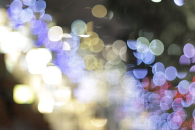 Defocused image of illuminated christmas lights