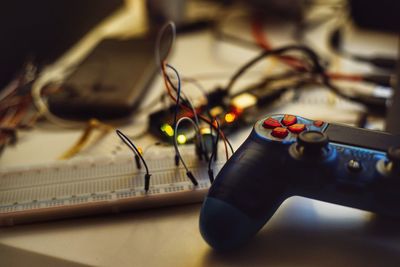 High angle view of game controller on table