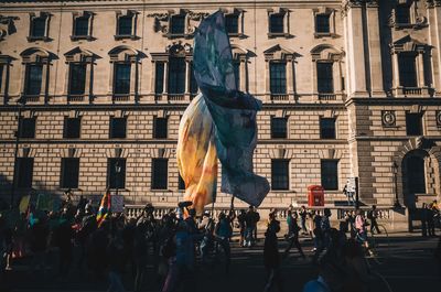 Group of people in front of building