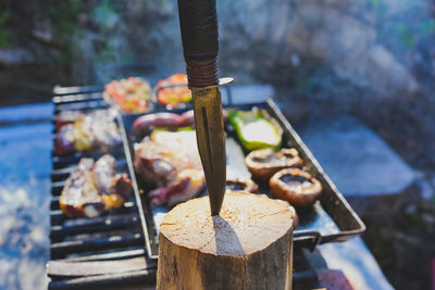 Close-up of meat on barbecue grill