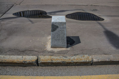 High angle view of sign on street