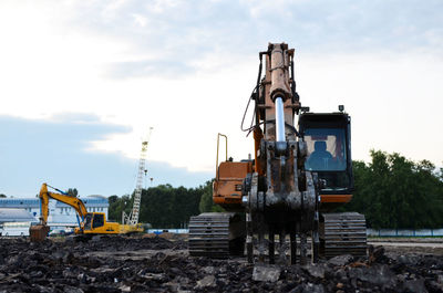 Construction site on field against sky