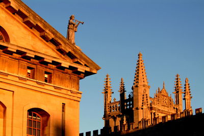 Low angle view of historic building against clear sky