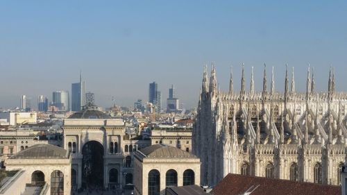 Panoramic view of cityscape against clear sky