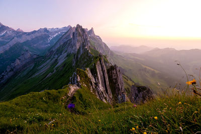 View of rocky mountains against sky