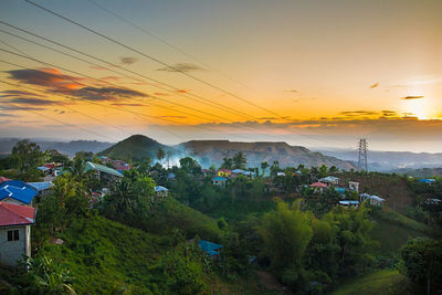 Scenic view of landscape against sky during sunset