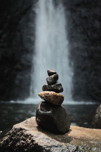 Close-up of pebbles on rock