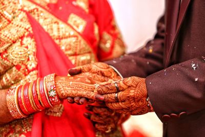 Close-up of woman hand holding umbrella