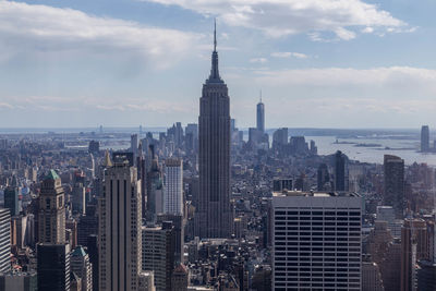 Aerial view of cityscape against sky