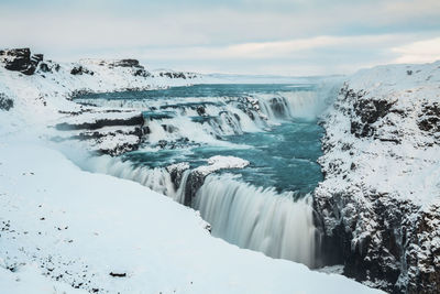 Scenic view of frozen sea against sky