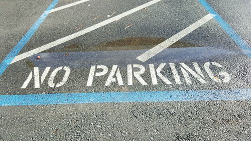 High angle view of no parking sign on road